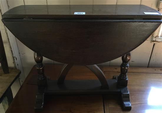 Small oak oval topped drop leaf coffee table